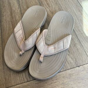 Grey crocs flip flops